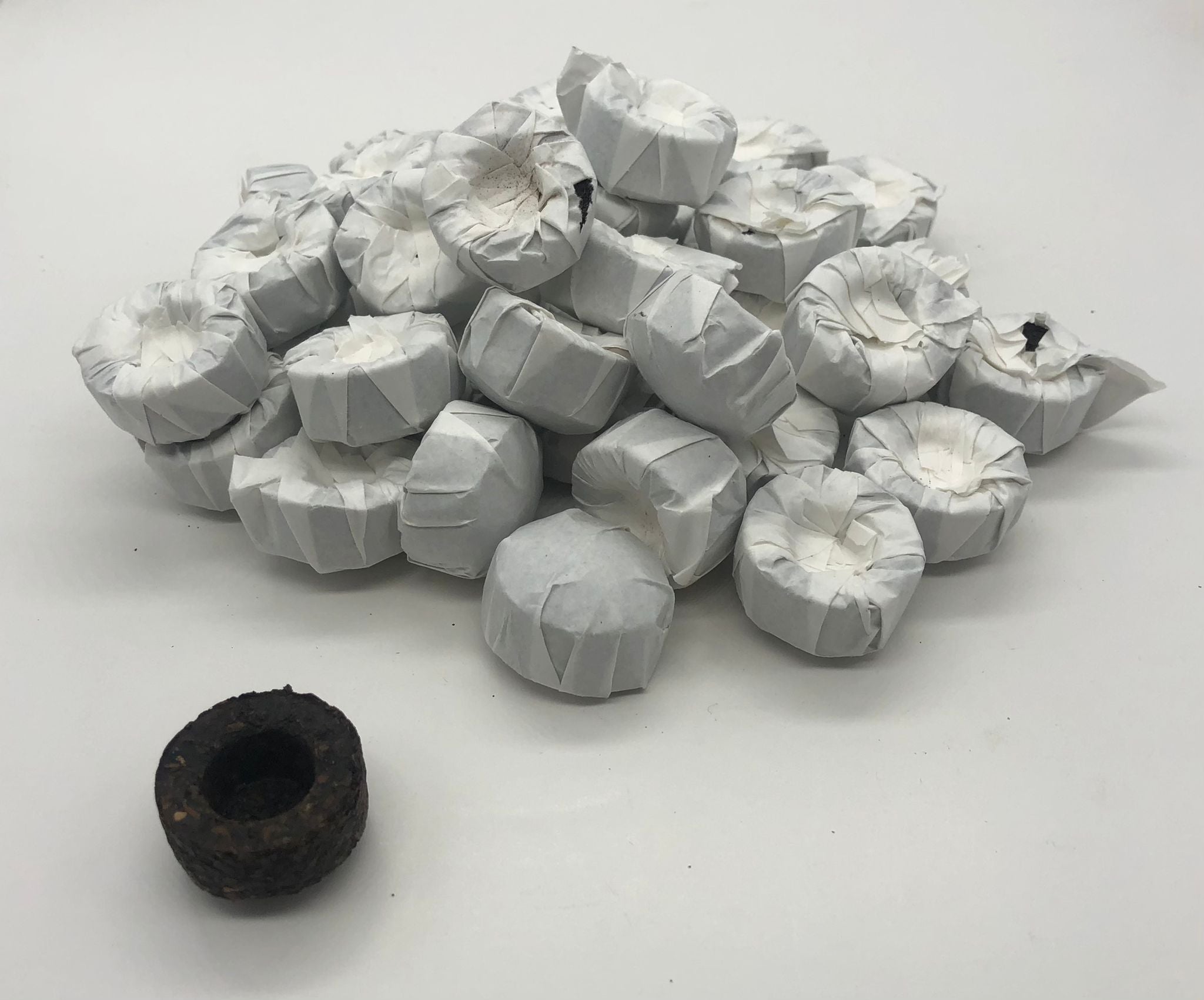 Schwarztee China Pu Erh Mini Tuo Cha